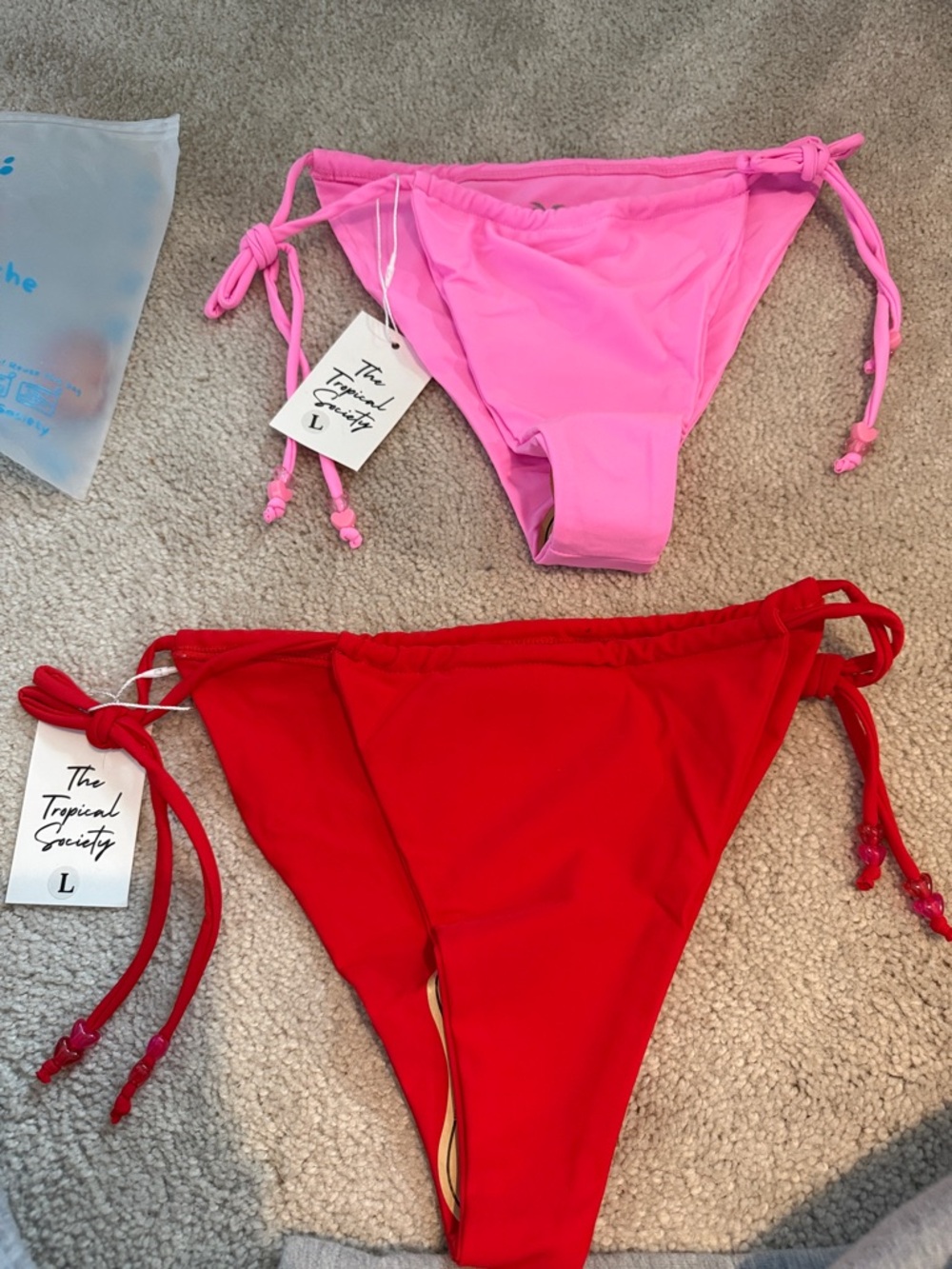 The tropical society, two bikini bottoms, red pink L NWT